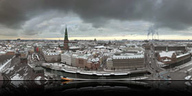 Panorama af vinterklædt København set fra Christiansborg